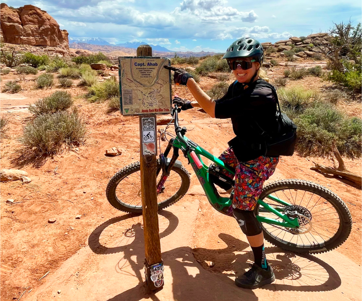 Rider pointing at the Captain Ahab trail sign