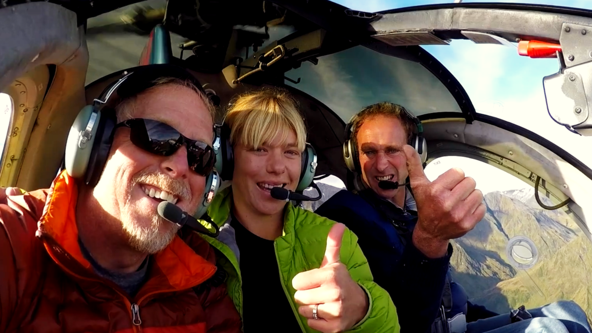 Lee and Kelly on a helicopter tour with the pilot